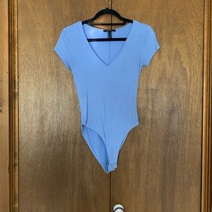 worn few times, women’s bodysuit. Size Medium